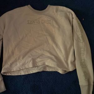 Tan Santa cruez crew neck, size large.